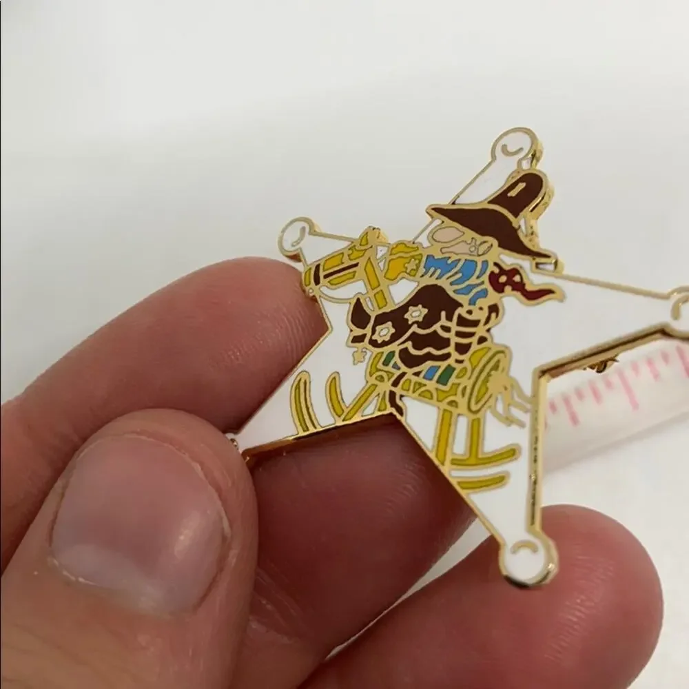 A cowboy on a Rockinghorse sheriff star pin
